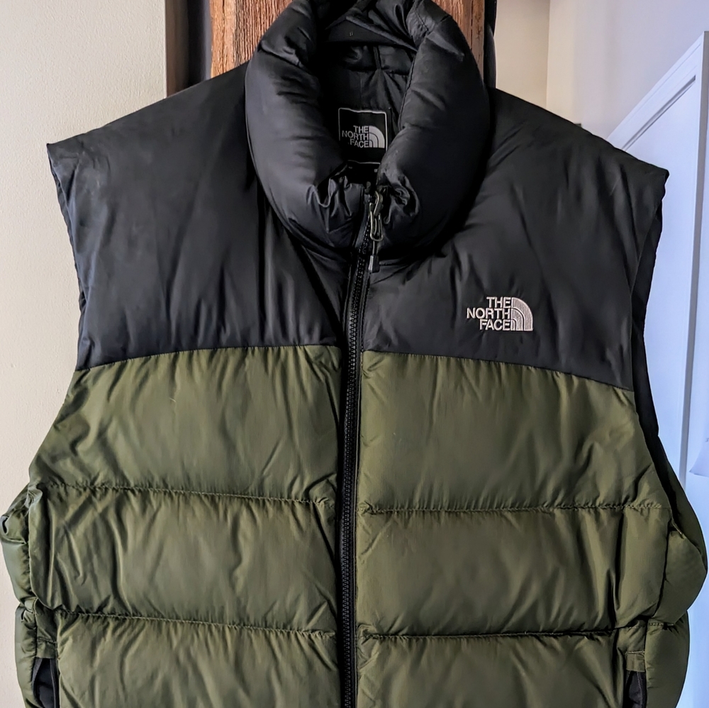 Green and black the North Face 700 vest
